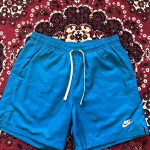 Шорты nike NSW CE short WVN flow